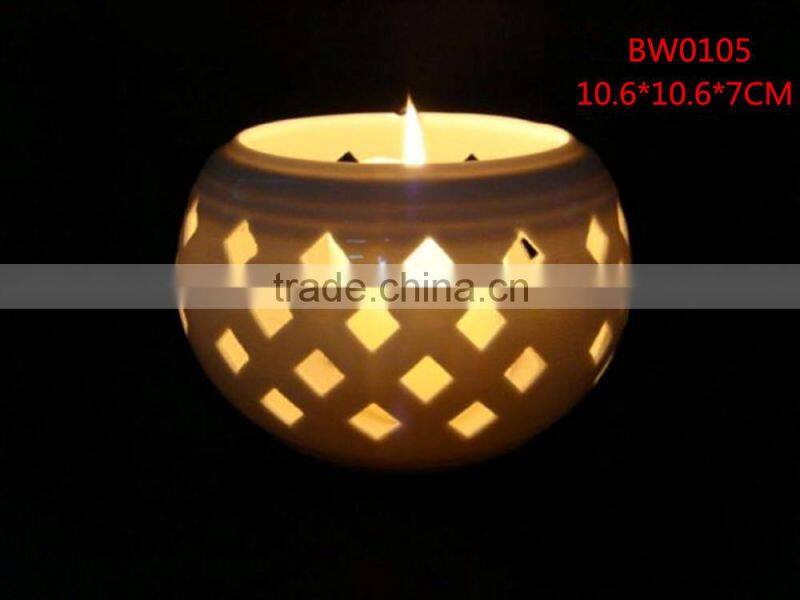 white porcelain round candle holders