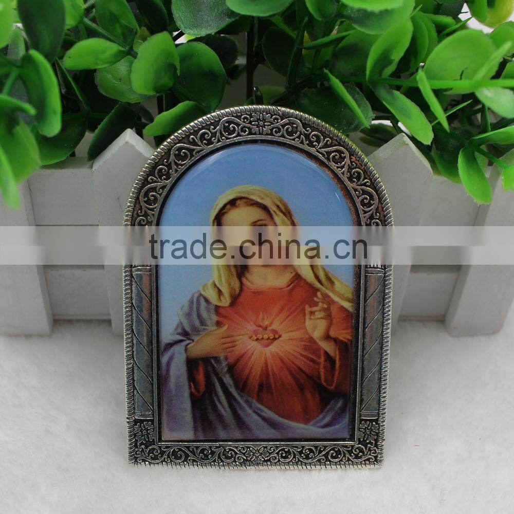Small Virgin Mary icon with metal holder