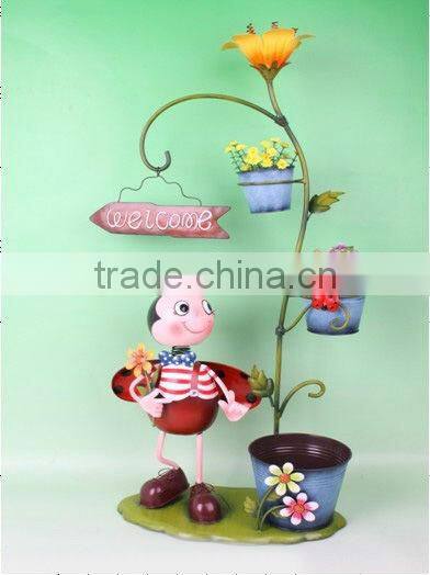 metal doll with flower used for home decor
