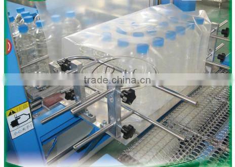 Automatic hot shrink film wrapping packing machine