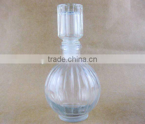 round glass wine bottle/ glassware