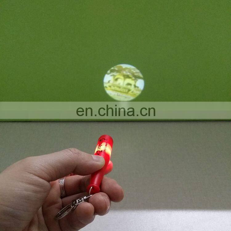 Wholesale price customized shape logo LED projector keychain
