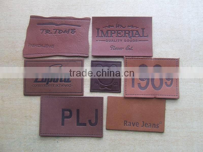 factory price 2016 hot embossed and printed sew on leather labels