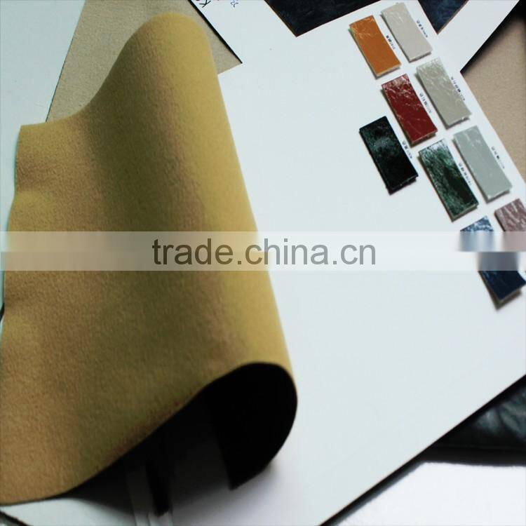 PU faux leather with scratch patterns ans shiny surface