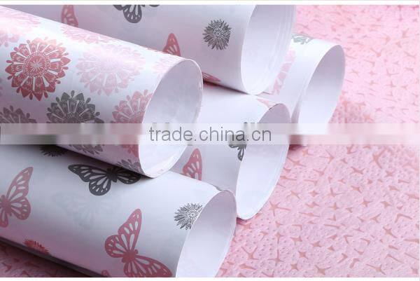 Ivory plastic gift wrapping paper roll