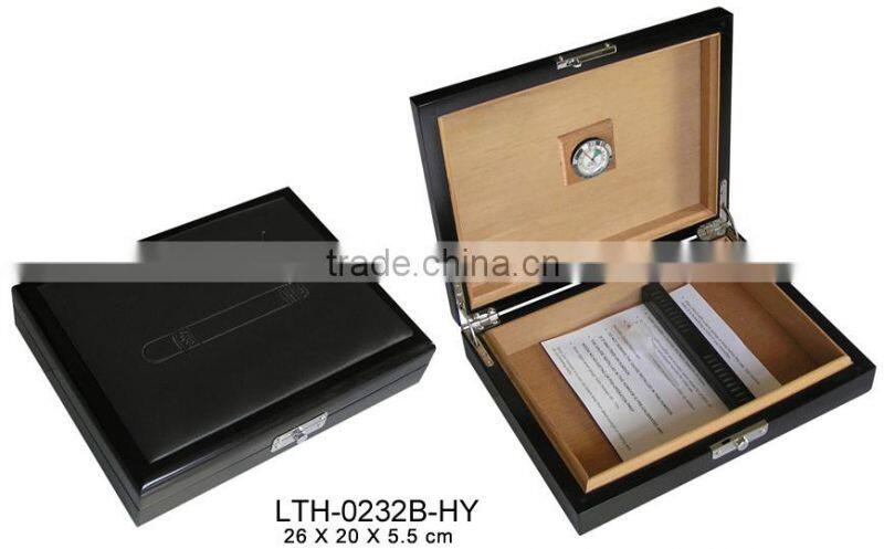 small wooden cigar humidor