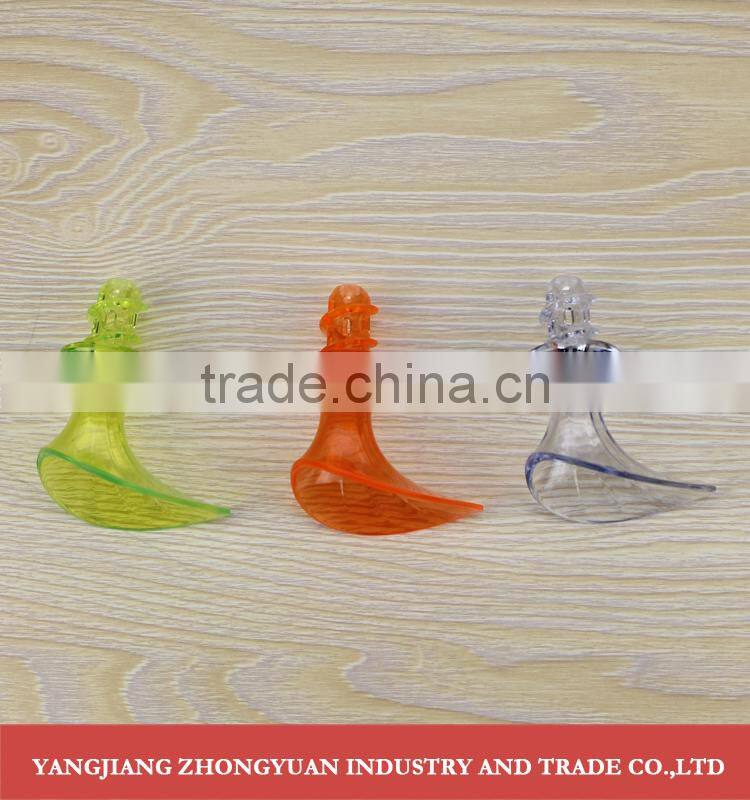 Plastic trumpet shaped hand lemon squeezer