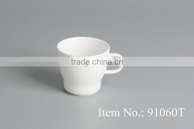 white porcelain tea cup with handle