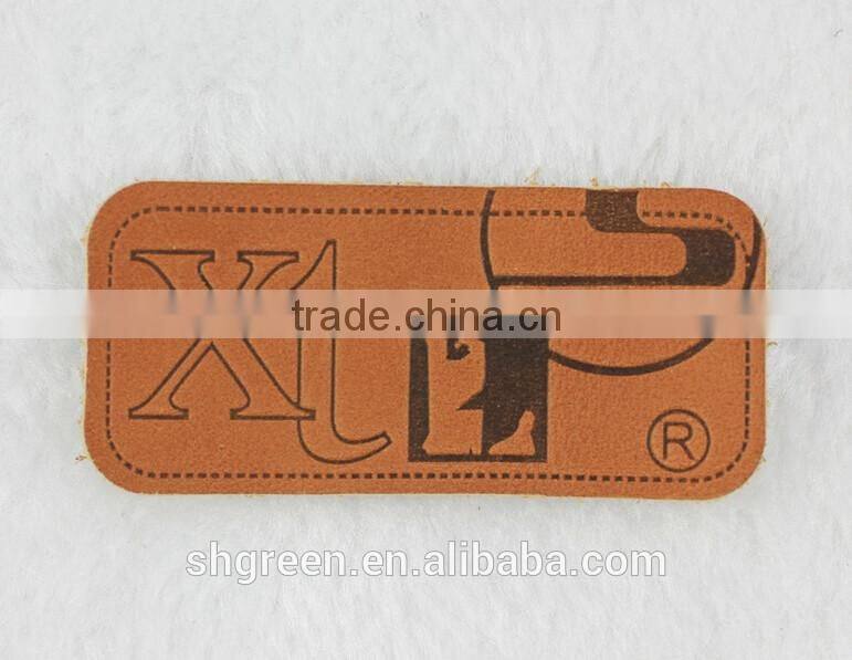 Unique design sewing on leather patch for pants