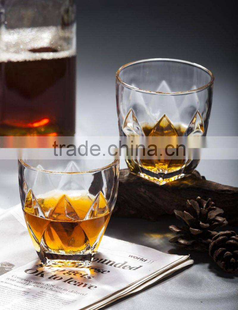 clear glass cup with machine made lotus pattern for drinking
