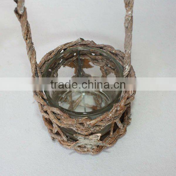 Rattan candle holder with handle