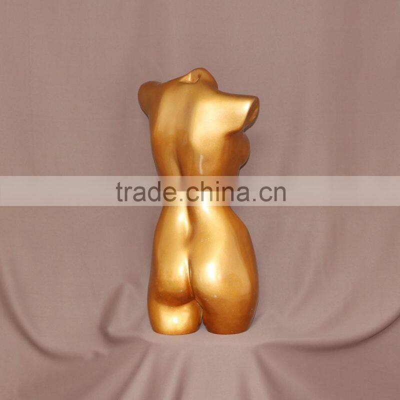 Bright gold upper-body female mannequin