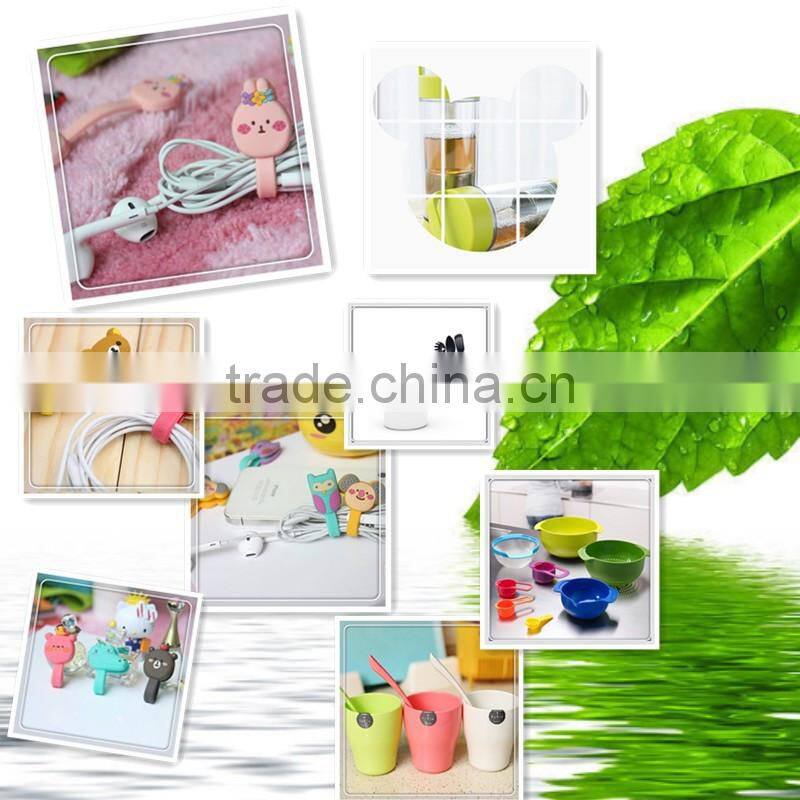 China manufacturer custom yellow duck lovely plastic earphone cable winder/earphone cable holder