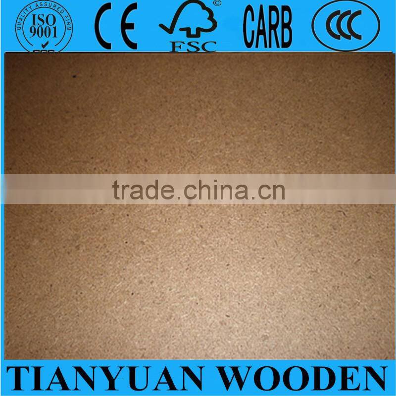 Dark brown hardboard 4x8 with smooth surface and rough back