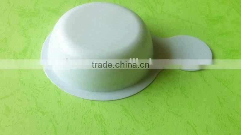 white disposable plastic tray for urine testing.