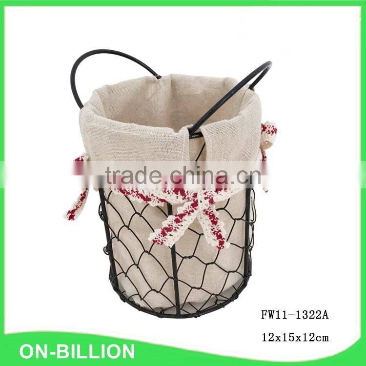 Small rustic tall wire basket with handle for storage