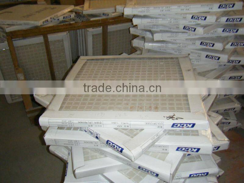 Dark emperador and ceramic composite tiles