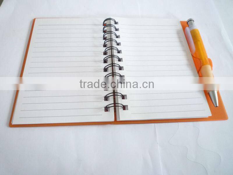 Hard cover spiral A5 notebook with pen