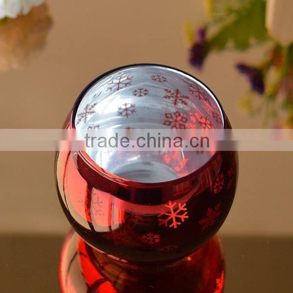 Stocked red glass candle holder for christmas