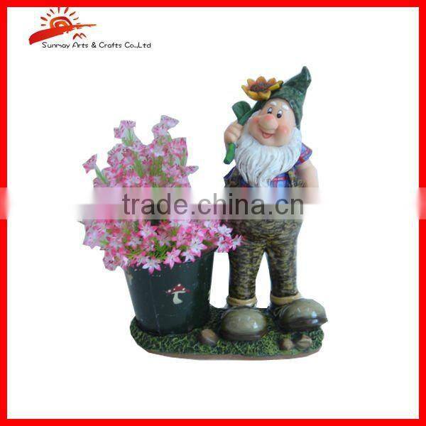 Resin gnome garden figurine with lotus leaf