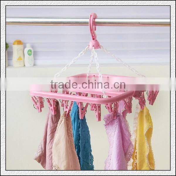 Cheap high quality foldable plastic hard hanger with lips for home cloth scoks bras in professional OEM maker