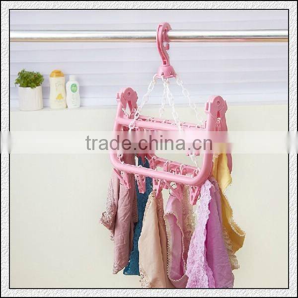 Cheap high quality foldable plastic hard hanger with lips for home cloth scoks bras in professional OEM maker