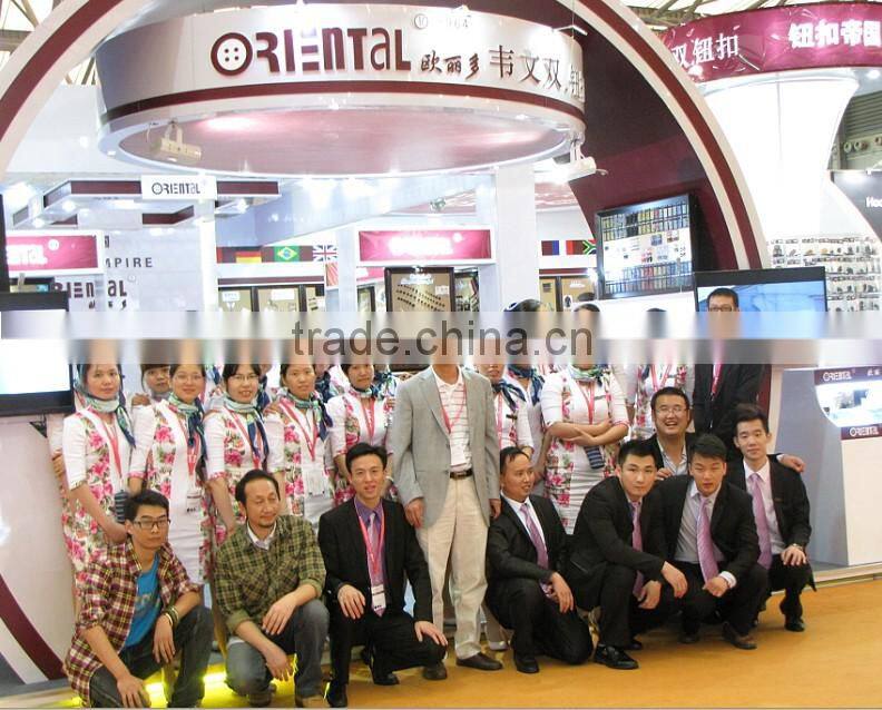 hign end fashion fuzz button in brown with silvern rim