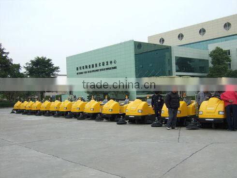 Automatic ride-on floor sweeper