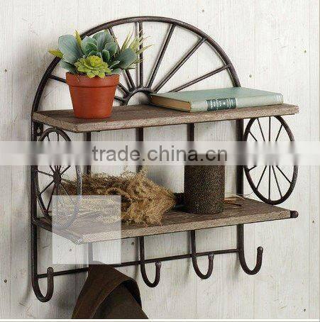 decorative wooden wall shelf with hooks on the bottom