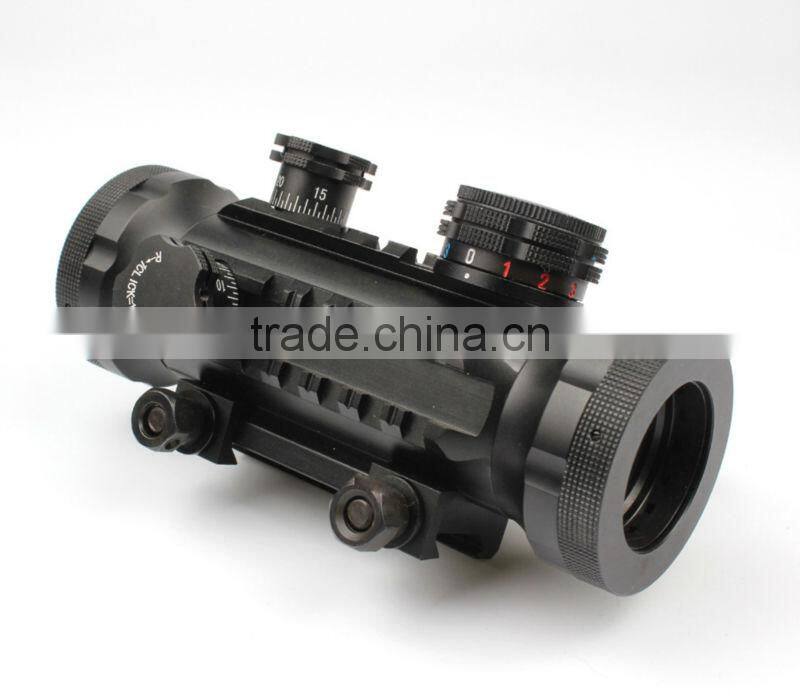 Compact red green dot riflescope with red laser attached