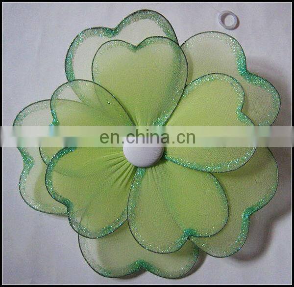 White lace flower with gold or silver glitter