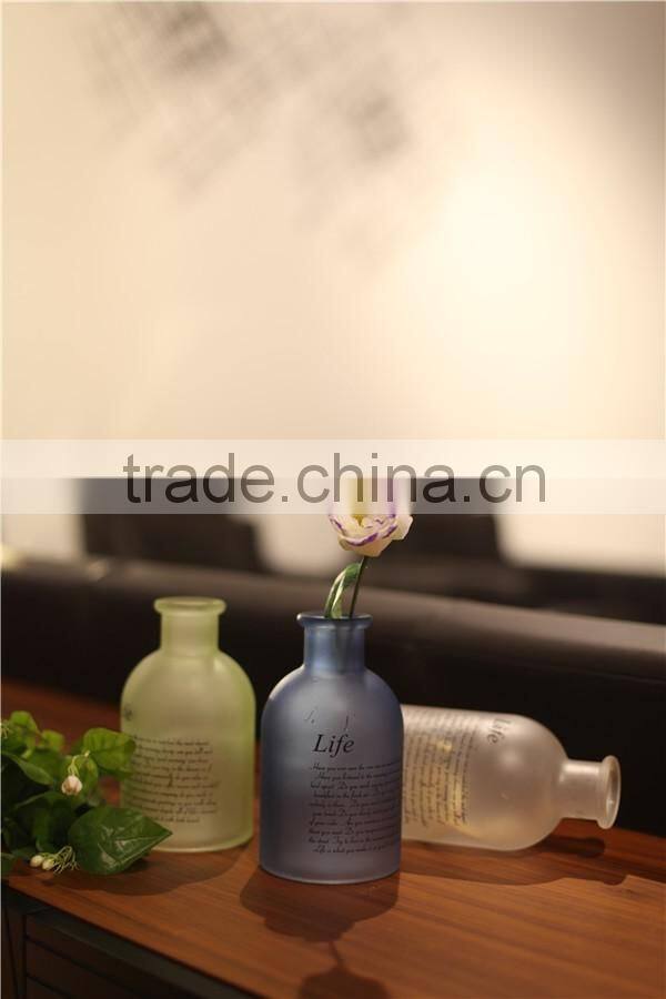 Lovely small round colored glass flower vase for living room