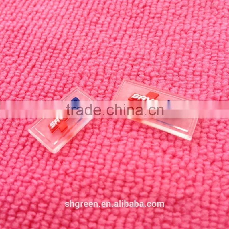Embossed,Rubber injection Technics Transparent PVC Material rubber clothing labels