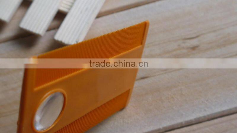 tick comb with magnifier