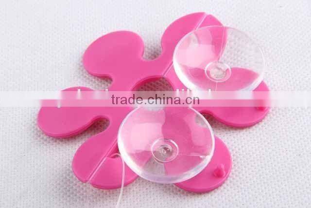 Flower shaped with two suckers folding toothbrush holder