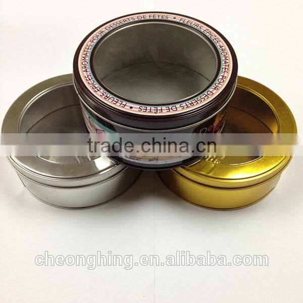Round tin box with window