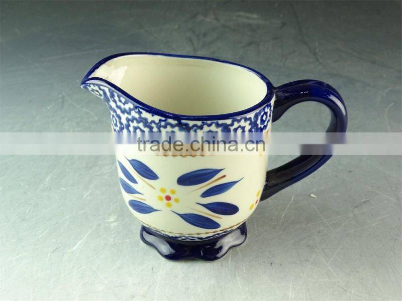 China factory unique shaped ceramic cup with handle, cheap stock porcelain cup for wholesale