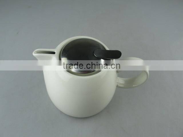 white round porcelain tea pot with stainless steel lid