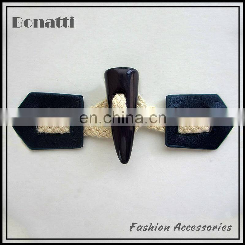 leather toggle button with golden metal buckle