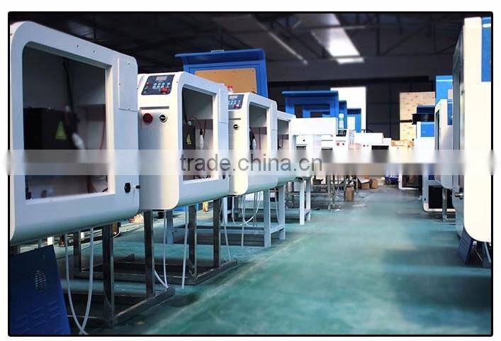 6090 roland laser cutting machine redsail laser cutting machine