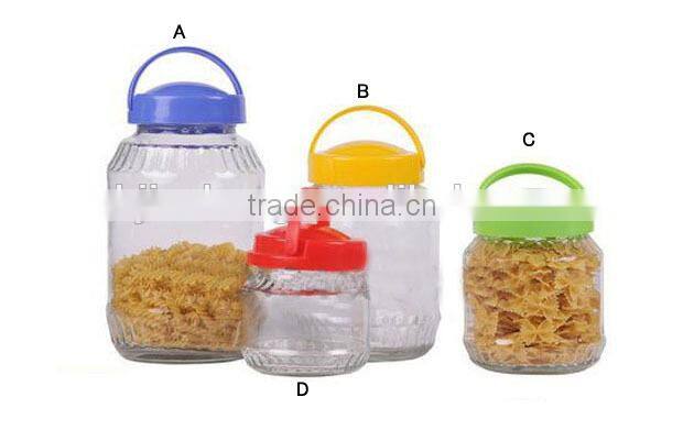 big glass liquid storage bottle with plastic hanging lid