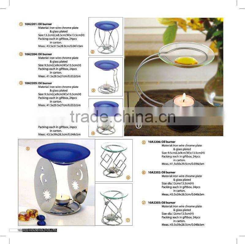 Four slender silver metal stylishly aromatherapy oil burners