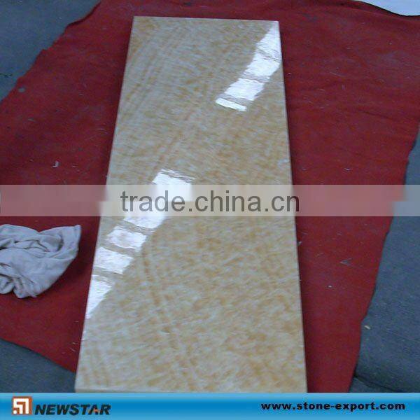 Honey yellow onyx.on posite glass