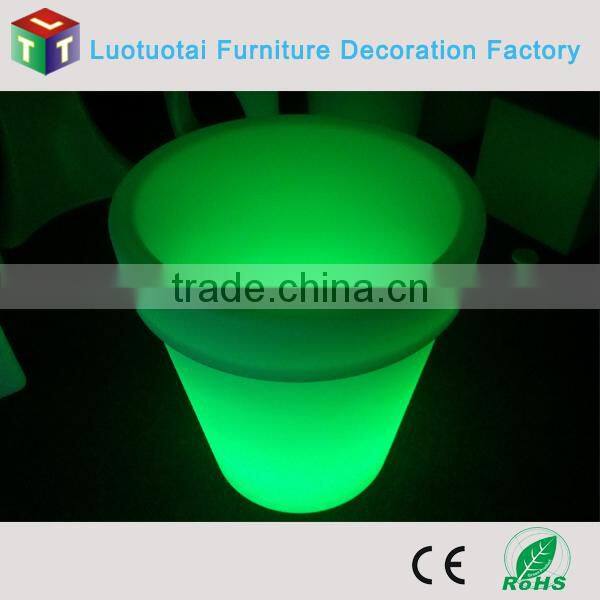 China manufacturer electric rotating flower pot with led lights for outdoor