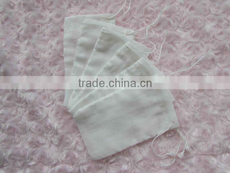 100% COTTON NATURAL MUSLIN DRAWSTRING BAG Sturdy cleans up easily and works great get the grain in the water without a mess