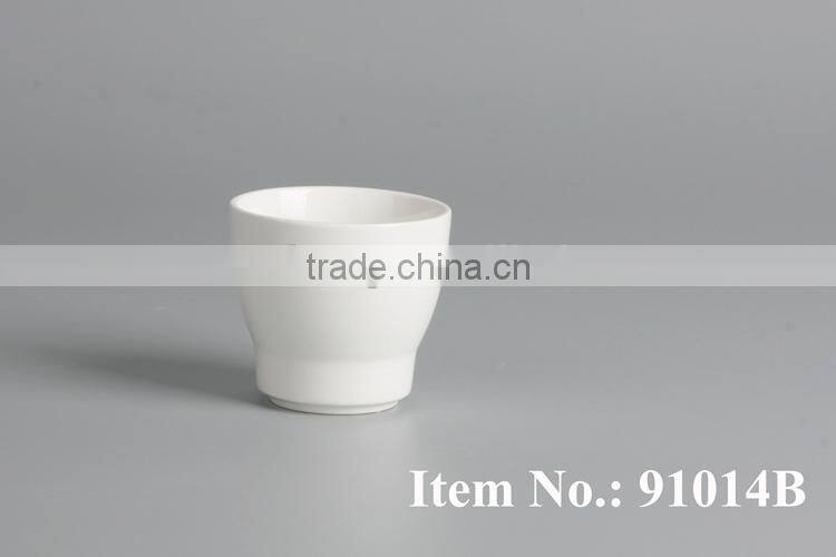 white porcelain tea cup