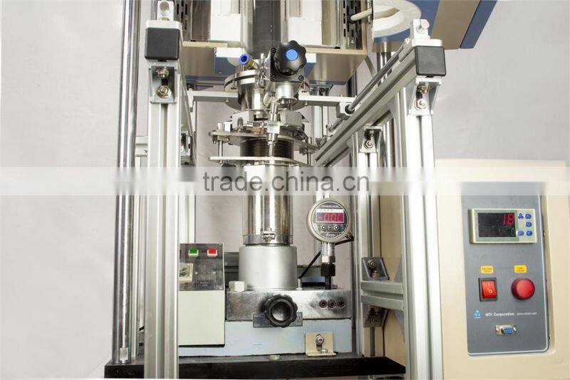 Vacuum heated pressing furnace for making dense compound materials