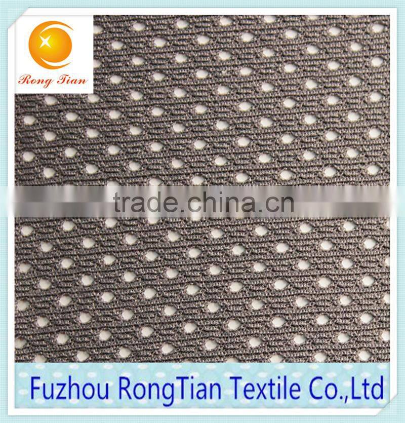 Factory sales grey polyester warp knitted low elastic hole lining mesh fabric