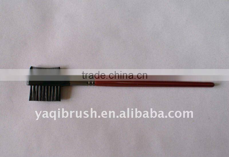 eyebrow comb and lash brush with red handle