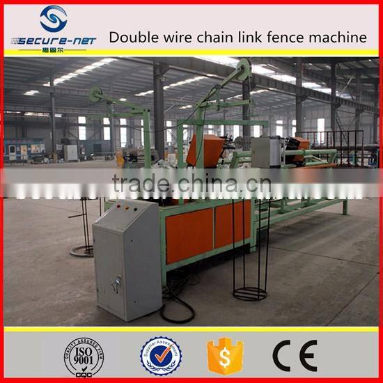 Double spiral automatic chain link fencing machine
